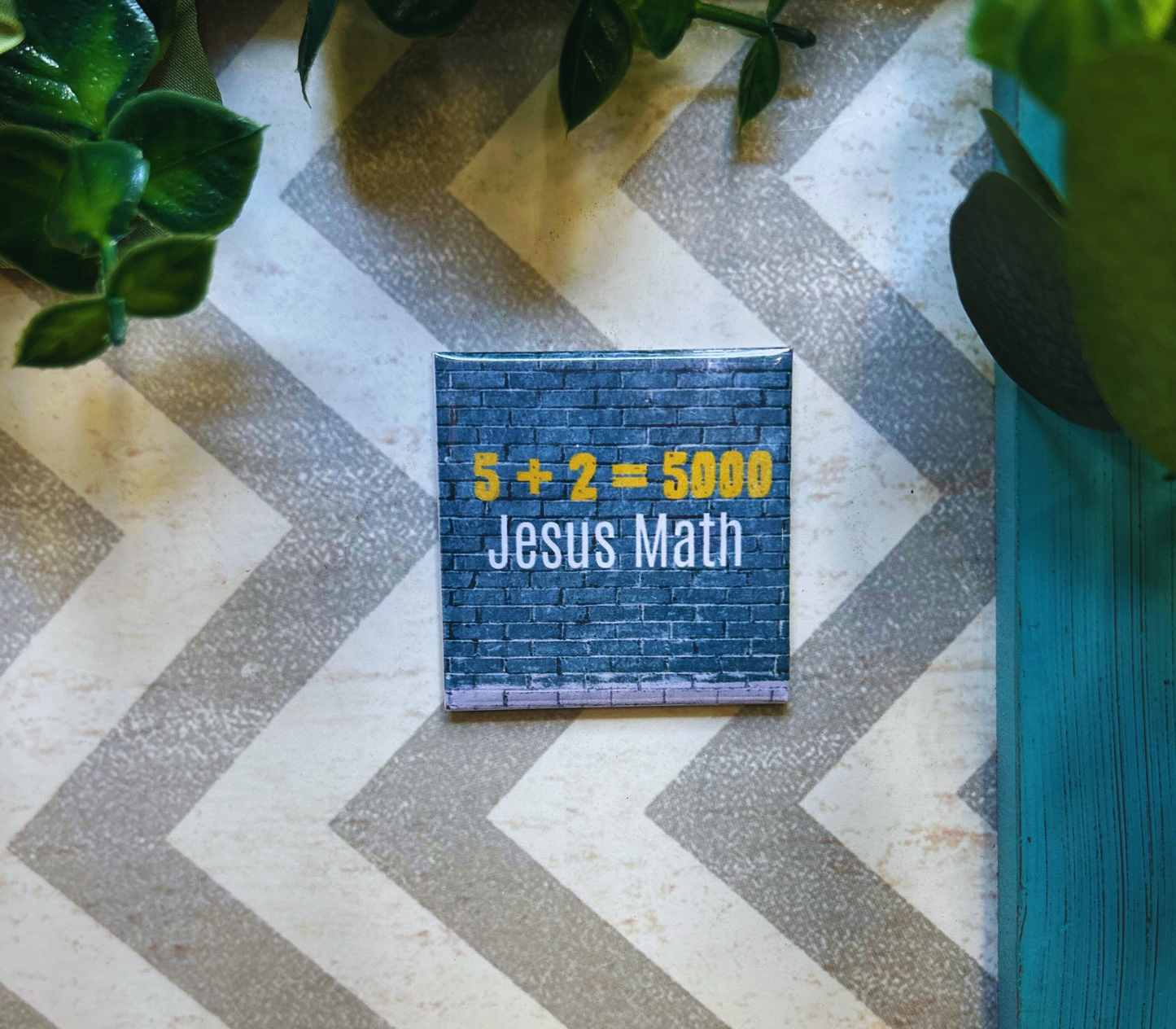Scripture design drop refrigerator magnet with '5 + 2 = 5000 Jesus Math' text.