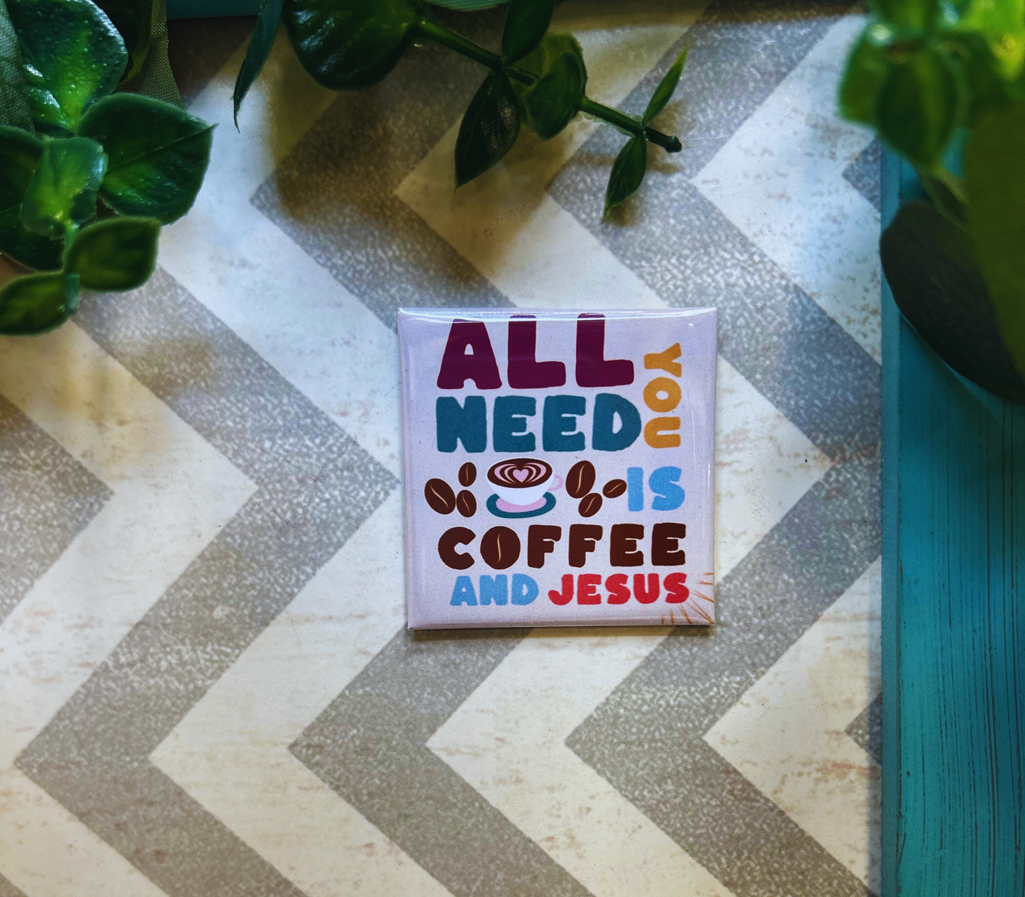 Scripture design drop refrigerator magnet with 'All you need is coffee and Jesus' text. 