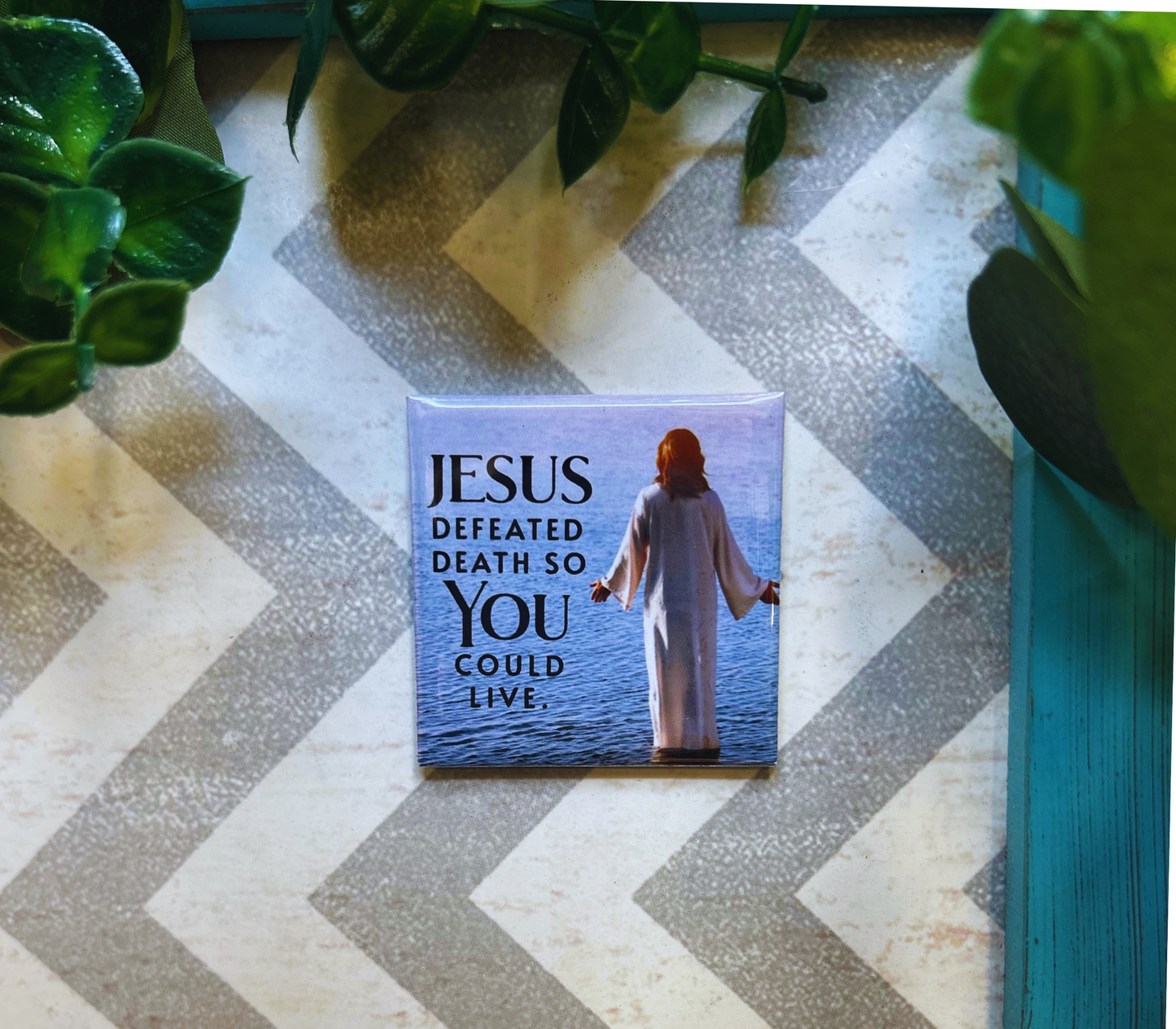 Scripture design drop refrigerator magnet with 'Jesus Defeated Death So You Could Live' text 