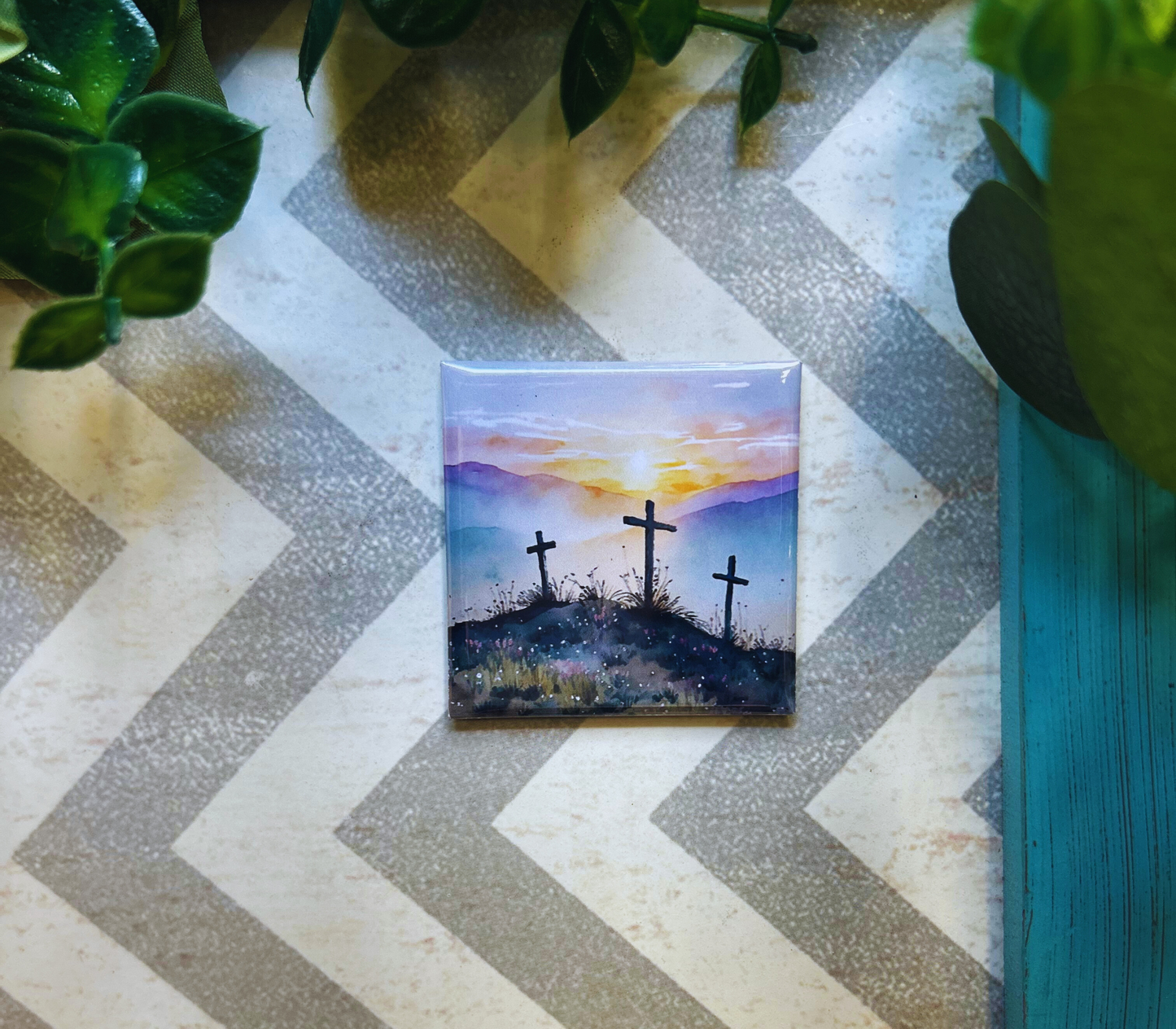 Scripture design drop refrigerator magnet with three crosses.